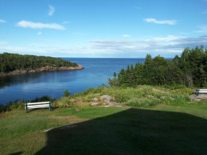 Гостиница Les Chalets au Bord de la Mer  Лез Эскумэн